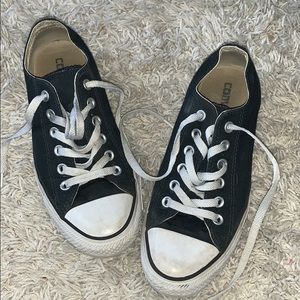 Black and purple low top converse